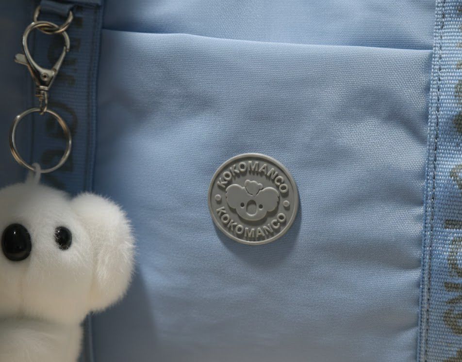 Cartera Impermeable Koko Mango - Modelo Monique